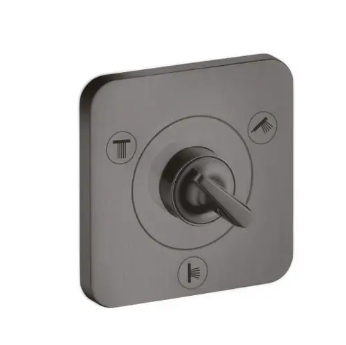 AXOR Ventil in Brushed Black Chrome mit einem zentralen Drehkopf und Symbolen zur Auswahl zwischen verschiedenen Ausgängen. Montage erfolgt unter der Wandoberfläche.